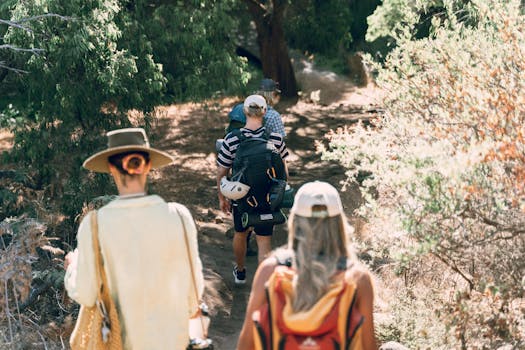 a group of volunteers cleaning up a hiking trail