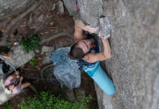 rock climber scaling a cliff