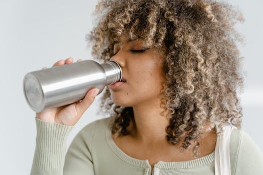 reusable water bottle and snacks