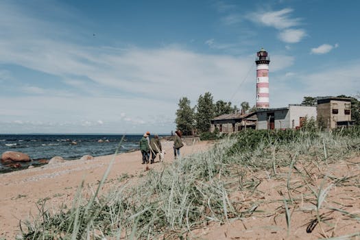 Group of friends cleaning up a beach during a fishing trip