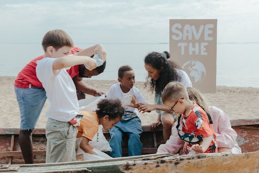 a group of volunteers cleaning a beach