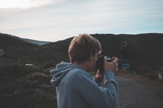 stunning landscape with a photographer capturing the moment