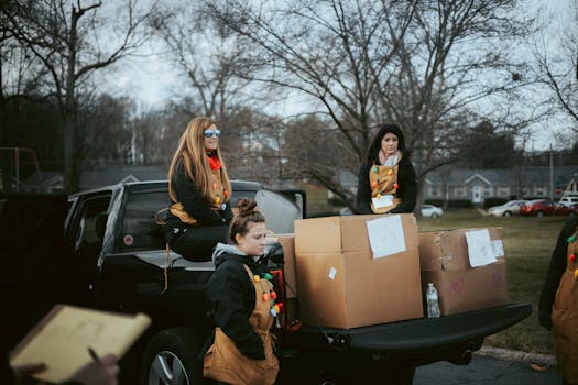 Volunteers sorting waste at an outdoor event